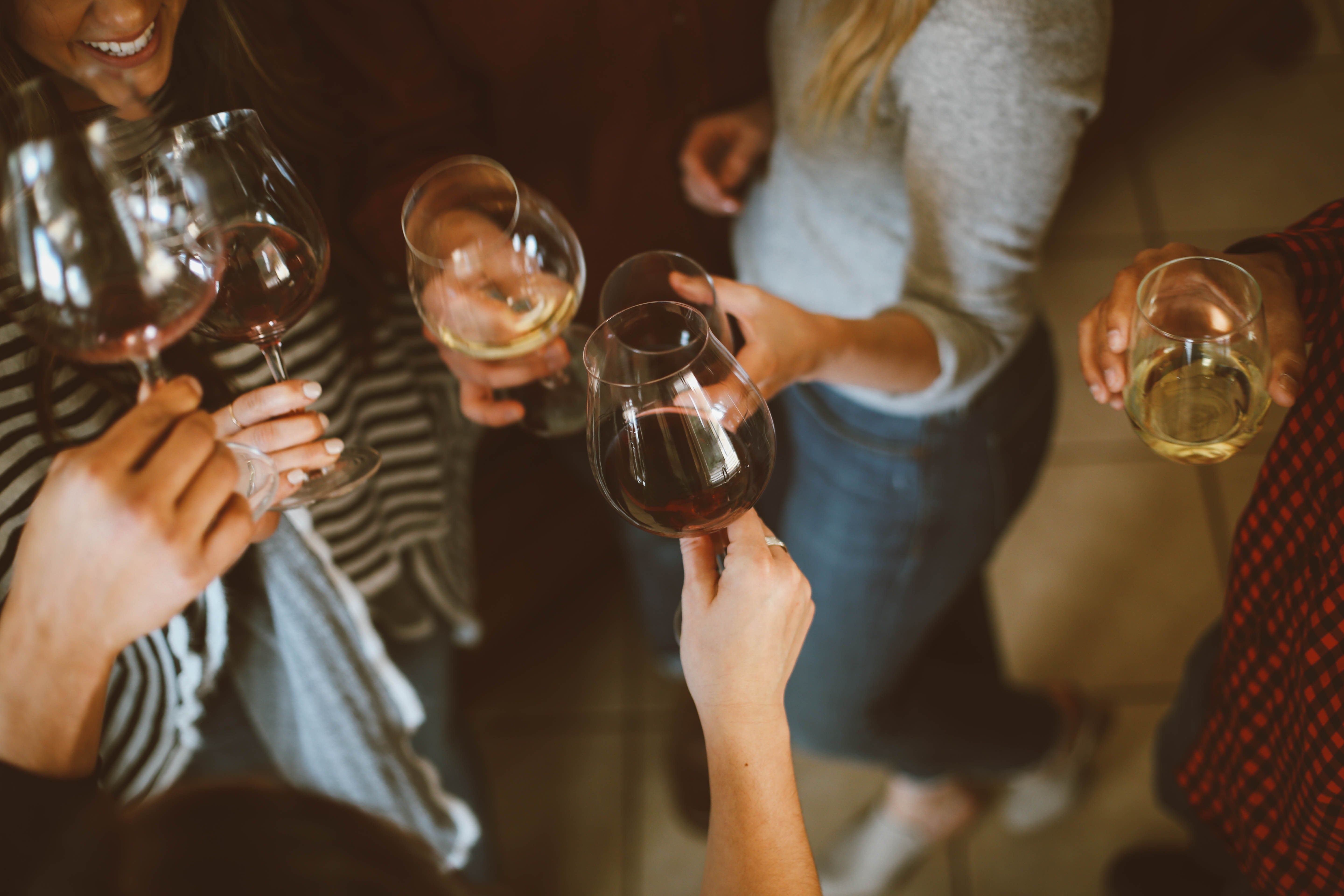 group of women drinking wine
